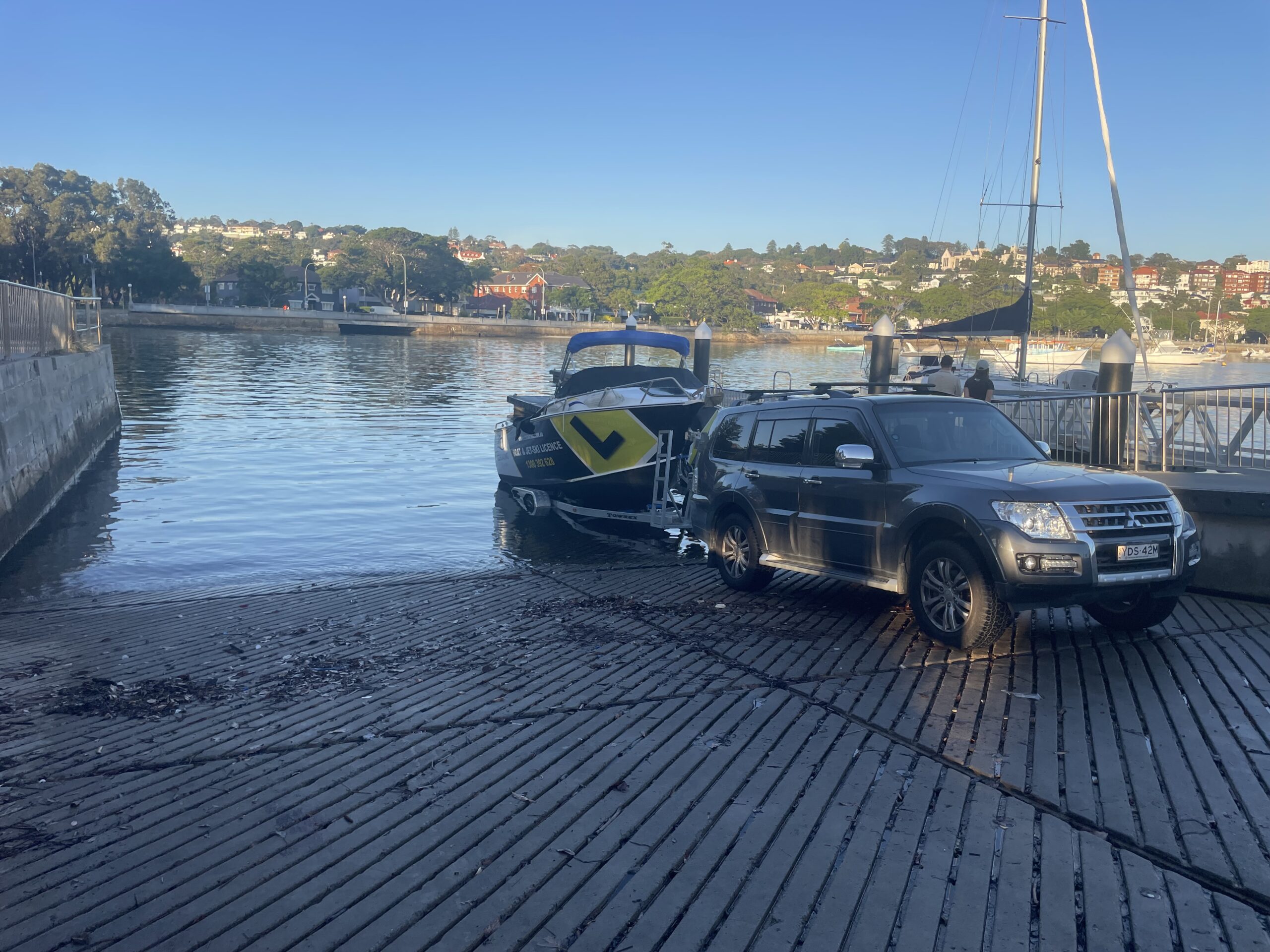 Boat licence Road Bay launching boat at boat ramp